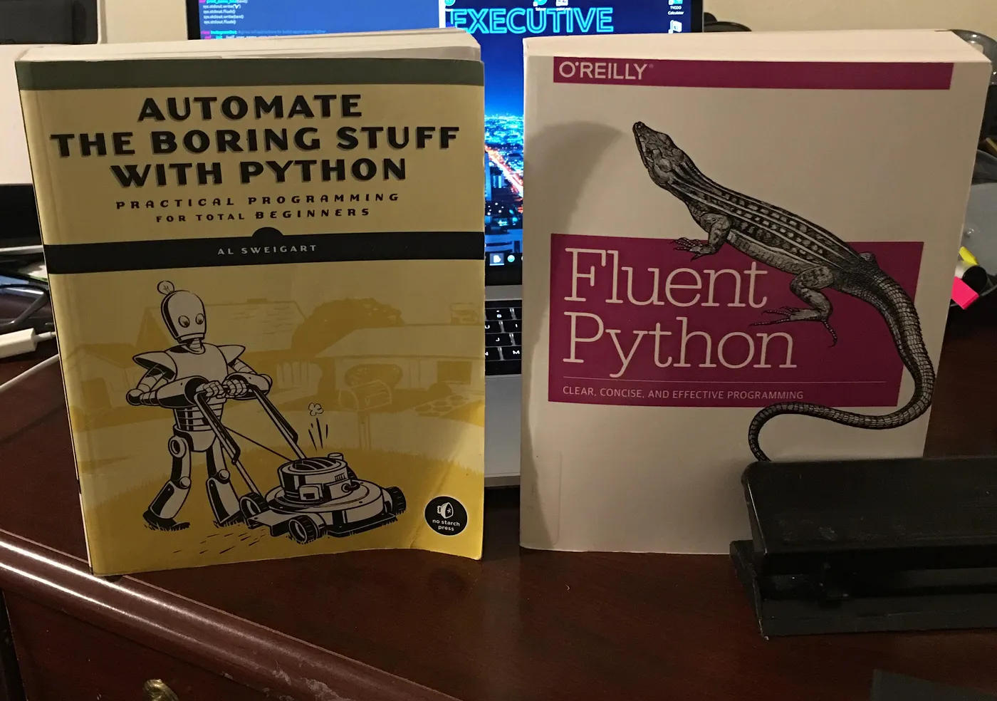 Python Books on a desk.